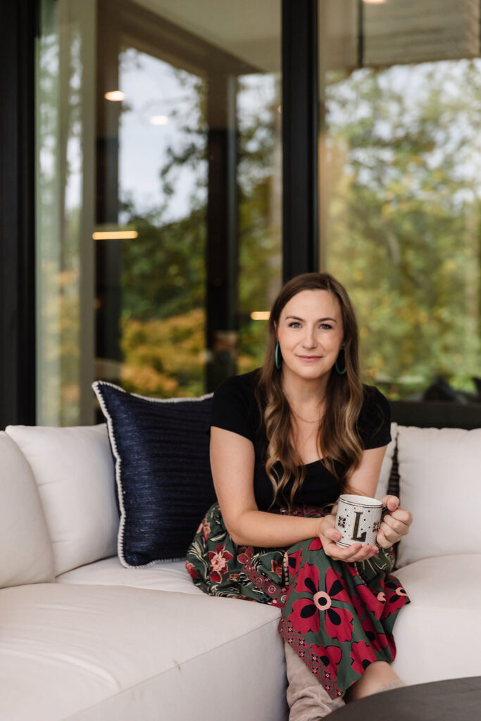 Woman holding coffee cup